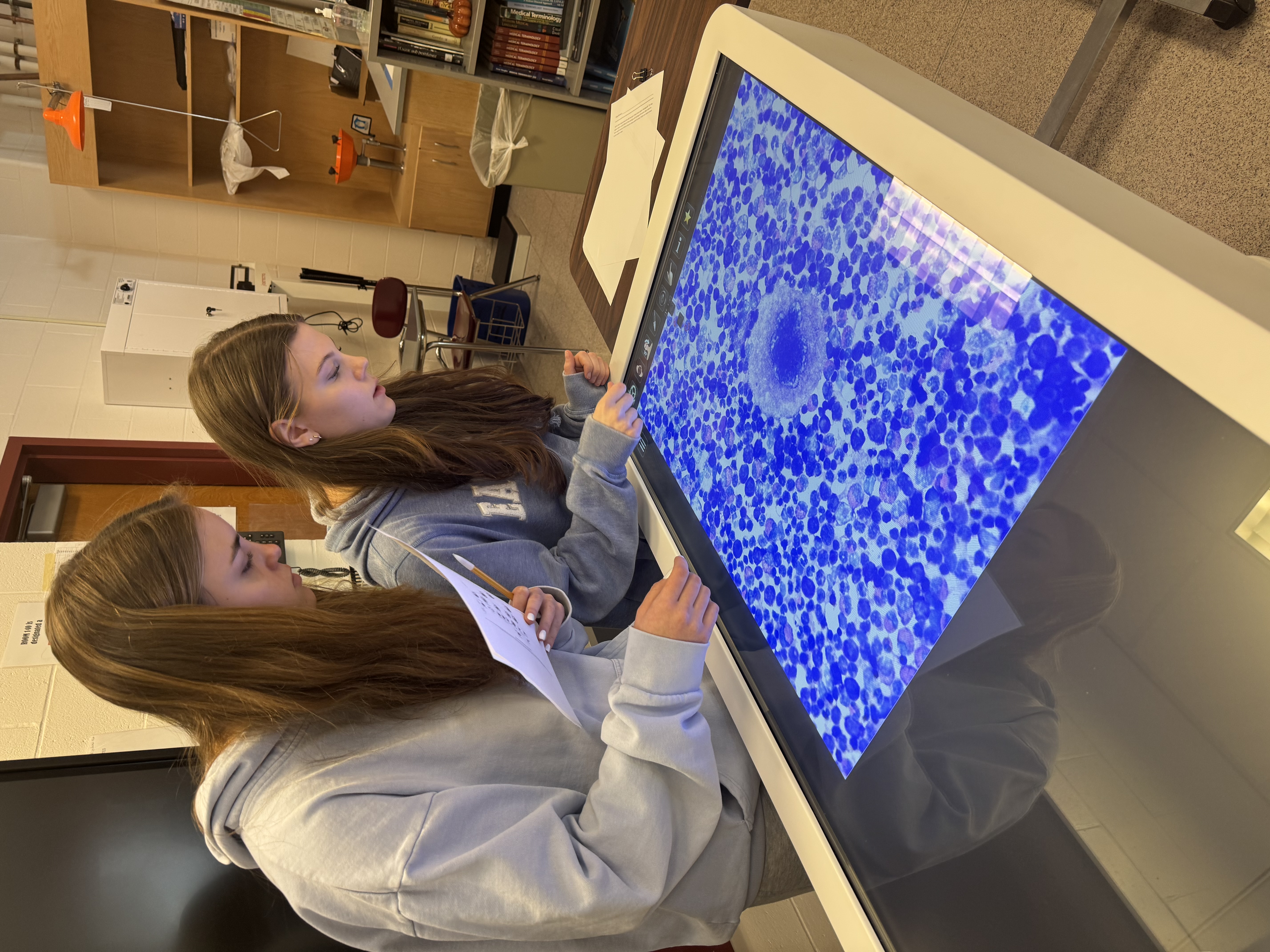 students with interactive table