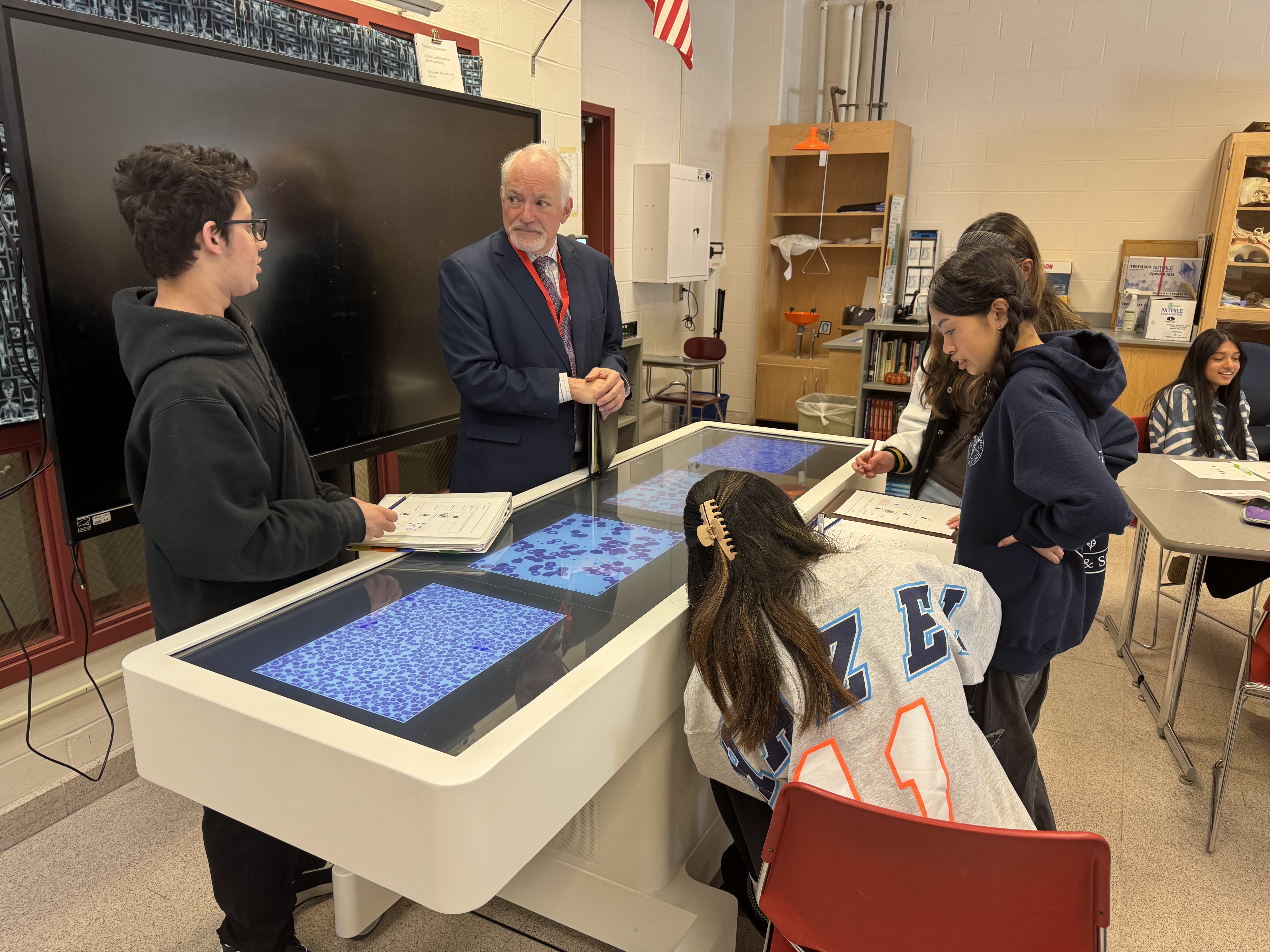 students with interactive table