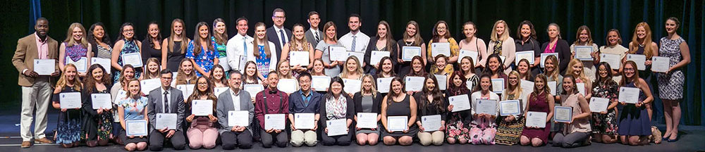 group of teachers receiving awards