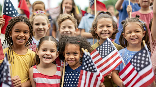 group of school children holding American flags