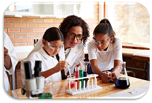 Students and Teacher working on a Chemistry Project