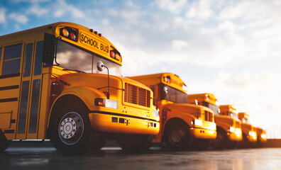 row of school buses in a parking lot