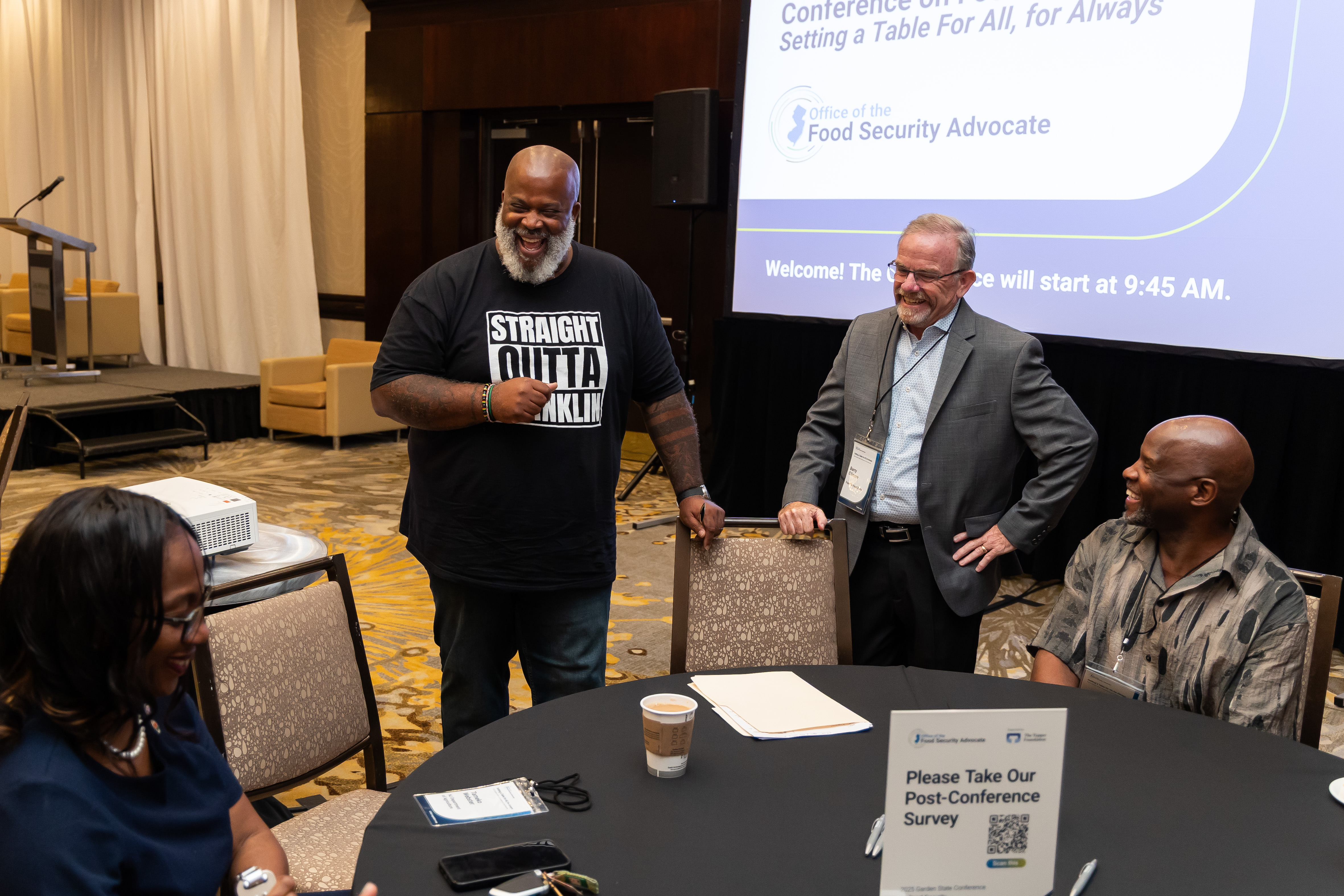 people talking at event