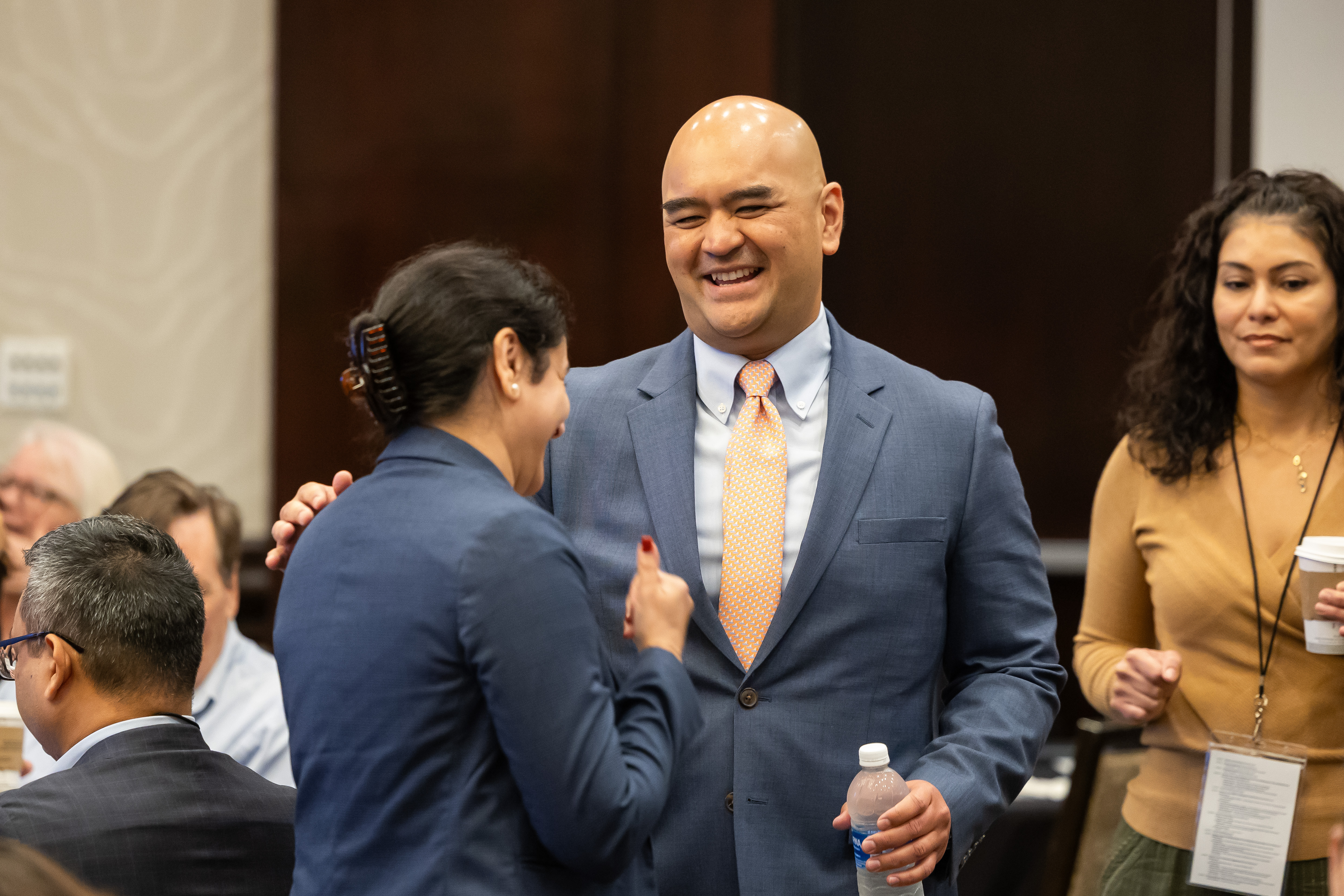 people talking at event