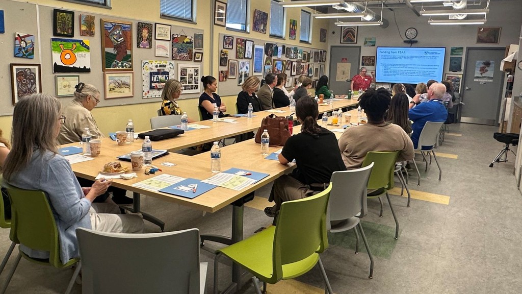 people around a boardroom table