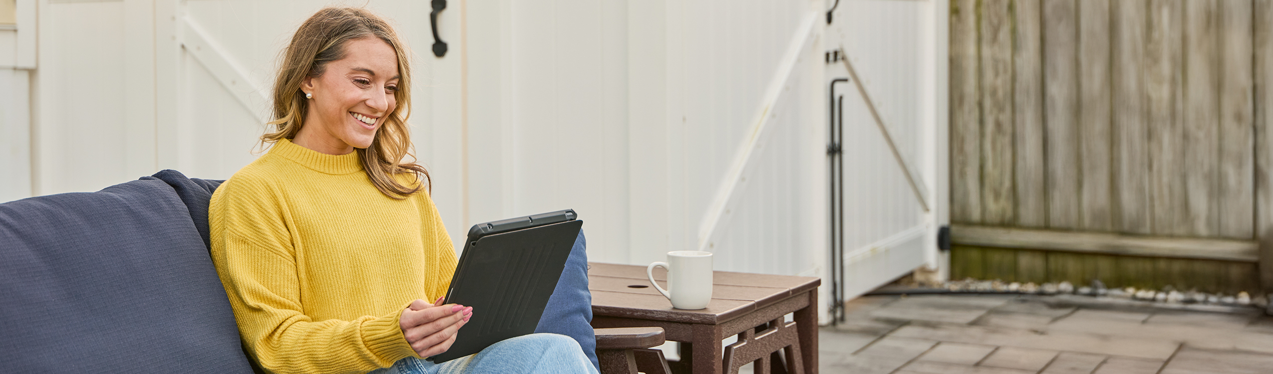photo: woman with laptop outside