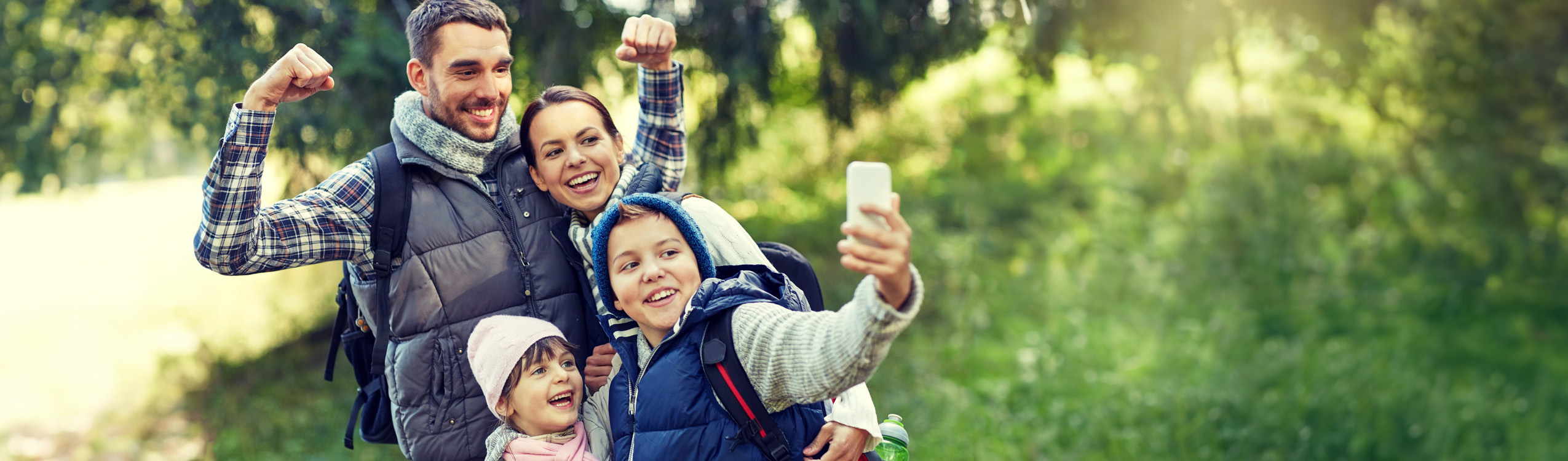 photo: family taking selfie