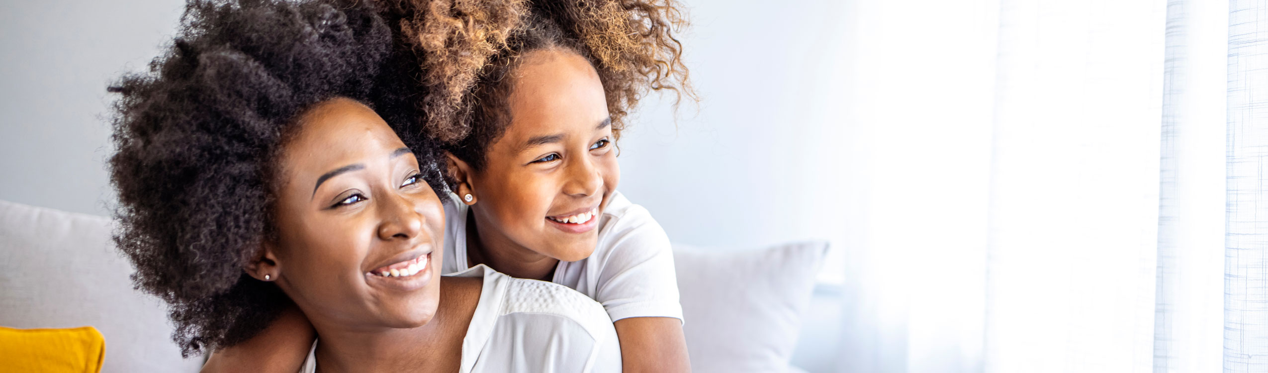 photo: mom and daughter smiling