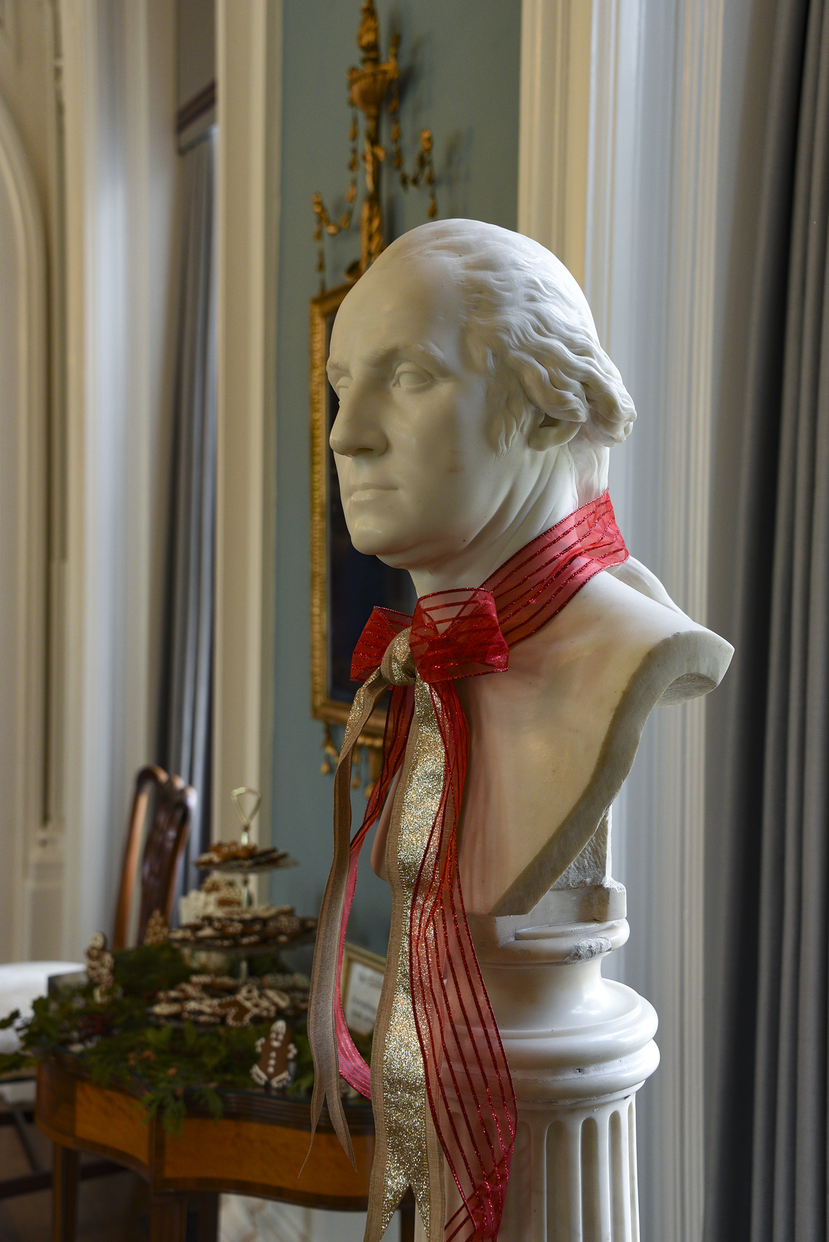 The bust of George Washington in the Music Room sports a sparkling red and gold ribbon. 