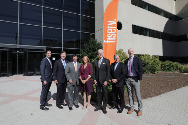 Photo of Governor Phil Murphy with Fiserv company representatives .