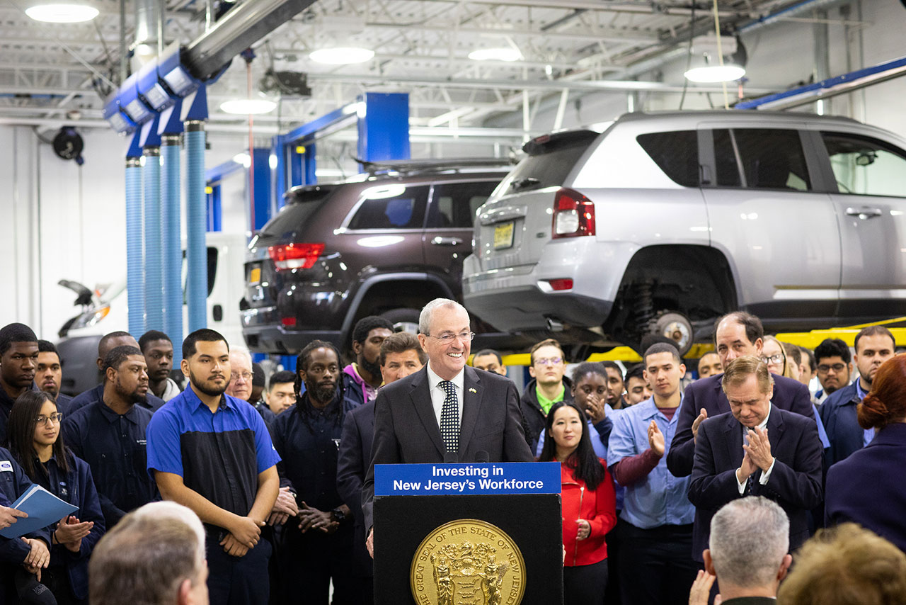 Governor Phil Murphy speaking at Sansone Auto Mall in Avenel