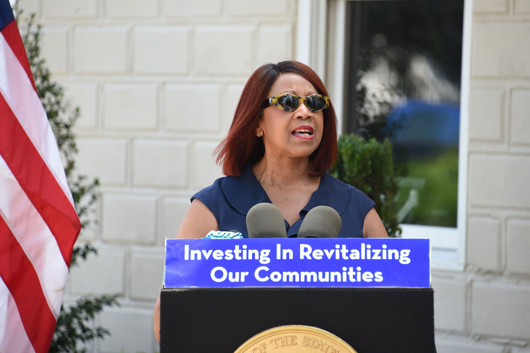 Acting Governor Sheila Y. Oliver announcing the award