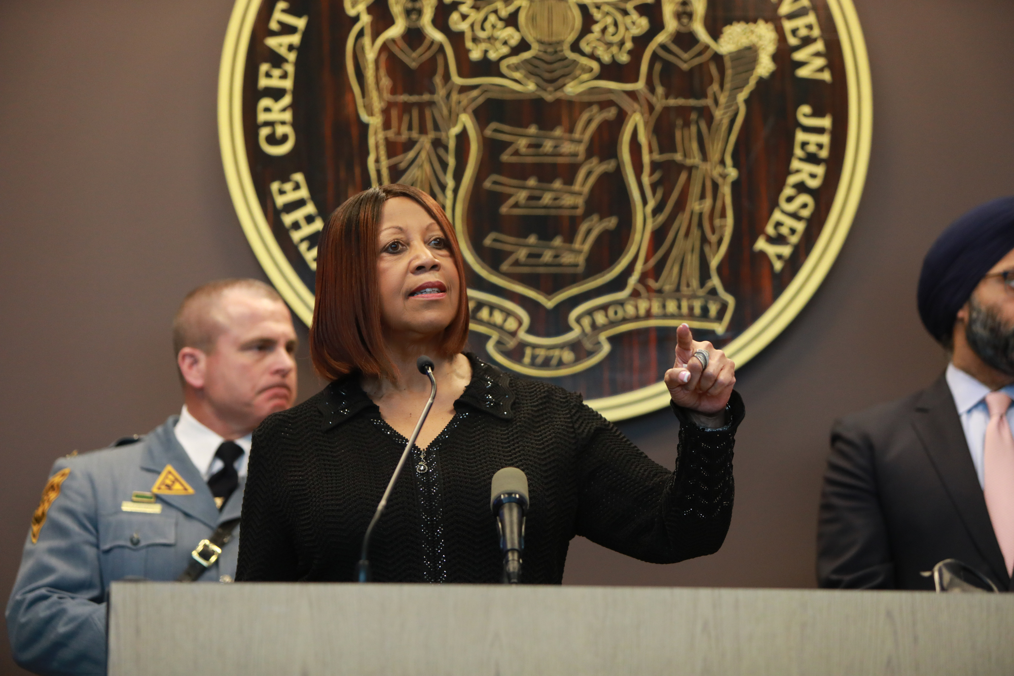  photo contains: Acting Governor Sheila Oliver speaking