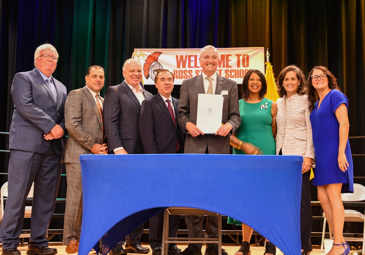photo: Governor Phil Murphy with signed legislation
