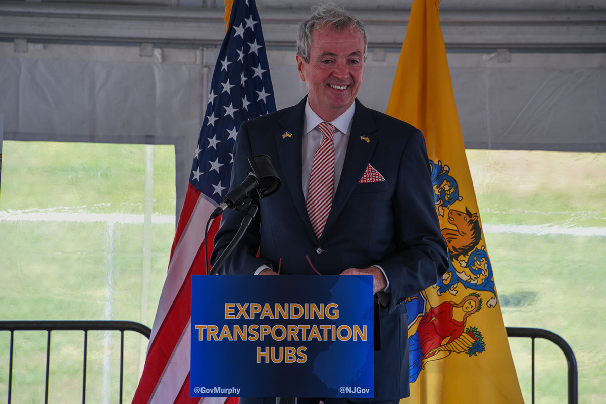 photo: Governor Phil Murphy standing, speaking, outdoor