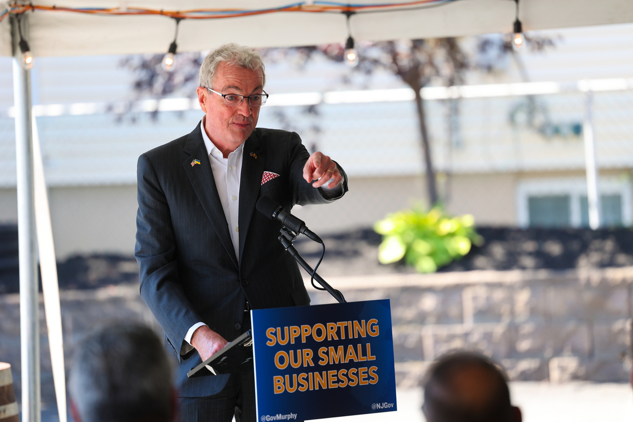 Photo: Governor Murphy fielding questions in a tent