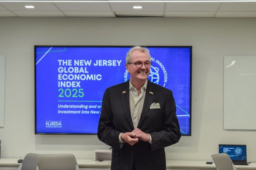 Governor Murphy in front of a screen