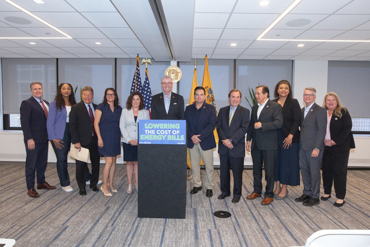 Governor Murphy at standing with a group of people