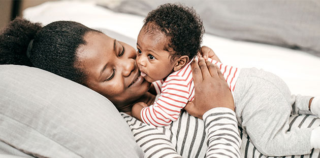  stock photo: woman holding a baby