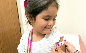 Child getting flu shot