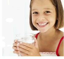 girl holding a glass of water