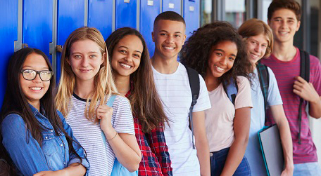 Photo: Group of students leaning on lockers