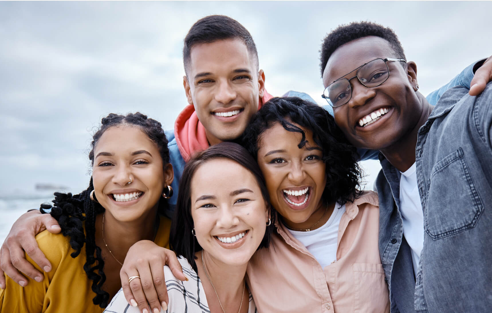 A group of young people smiling