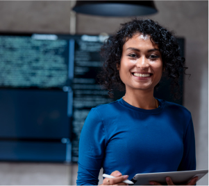 Woman holding a tablet and smiling