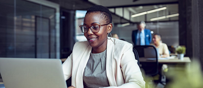 African american women by the laptop computer. typing