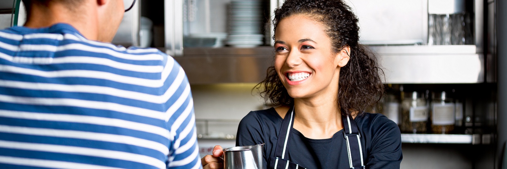 Young woman working at cafe