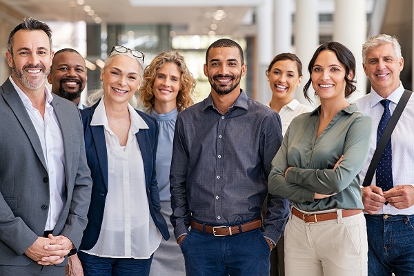 Group of co-workers posing for photo