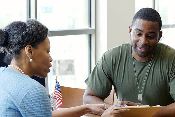 a veteran speaking with a specialist about available services