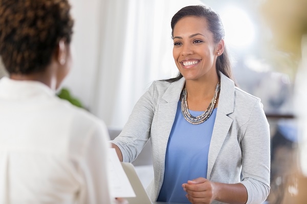 woman talking with another woman