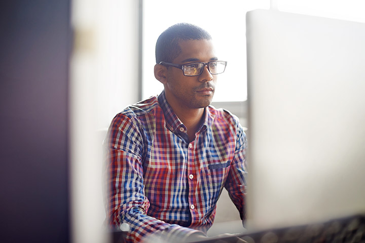 man at a desk in an office