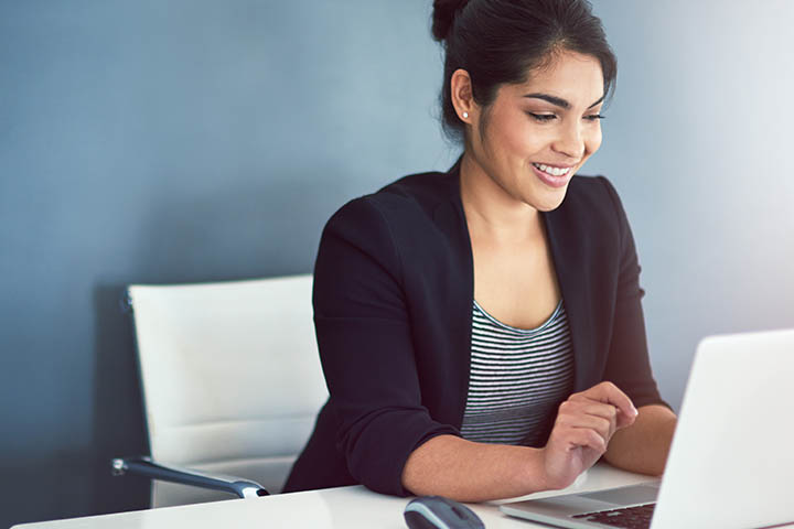 woman at a desk with forms