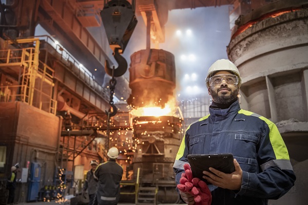 Steelworker during steel pour