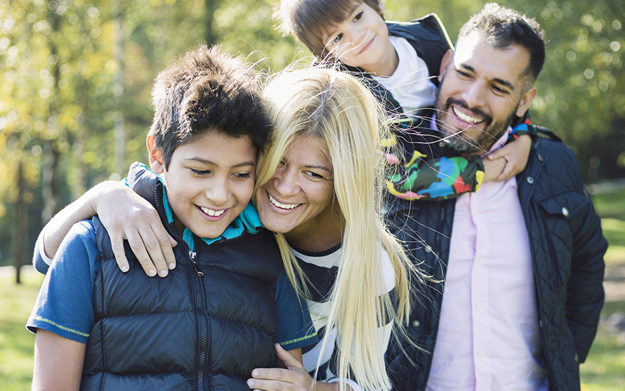 happy blended family walking together
