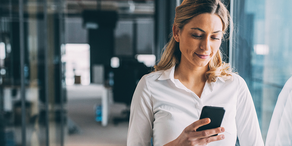 woman looking at phone