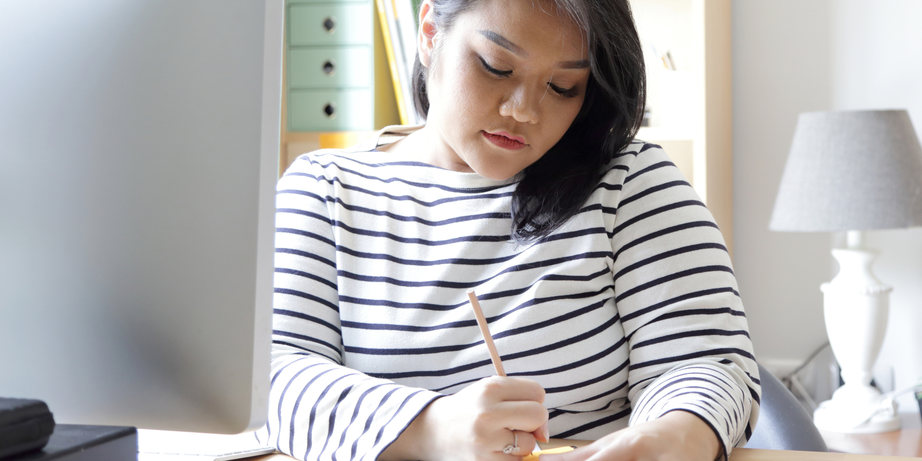 woman looking at computer