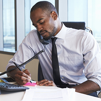 employer at his desk