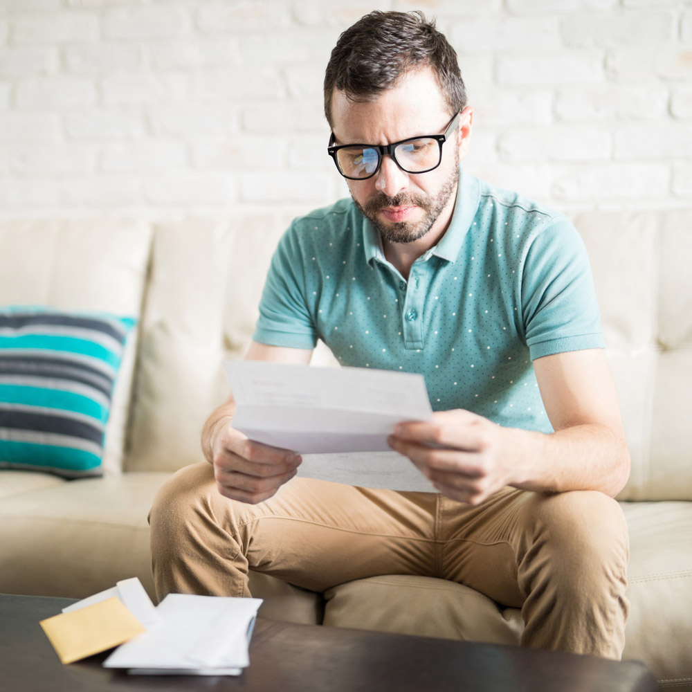 Man looking at paper