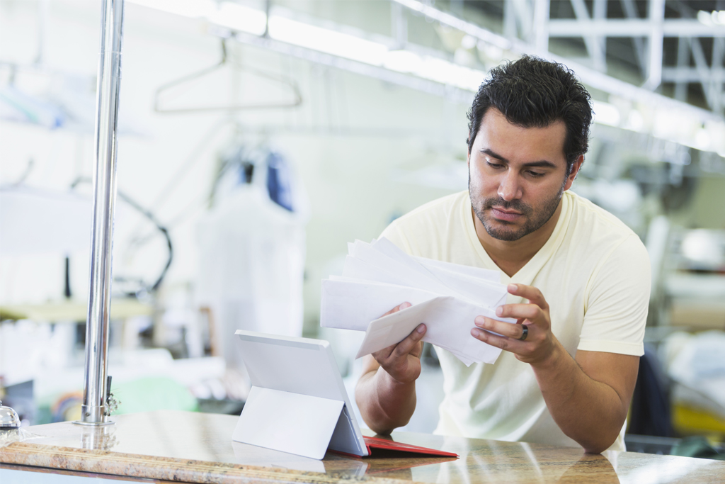 man reading a letter