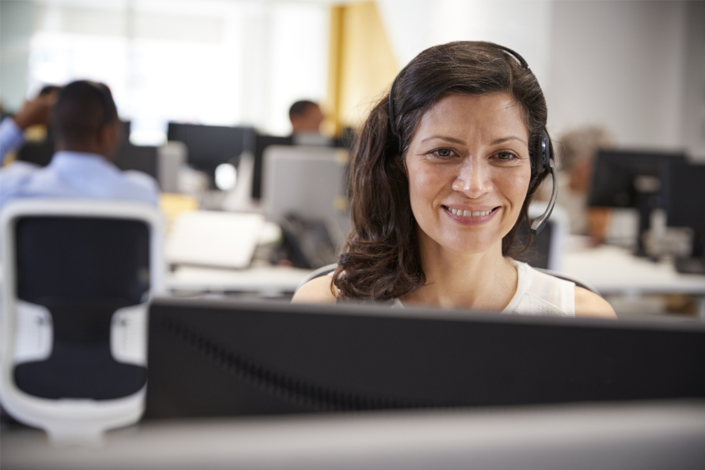 woman in a call center on a phone headset