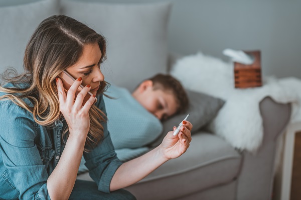 Woman caring for sick child