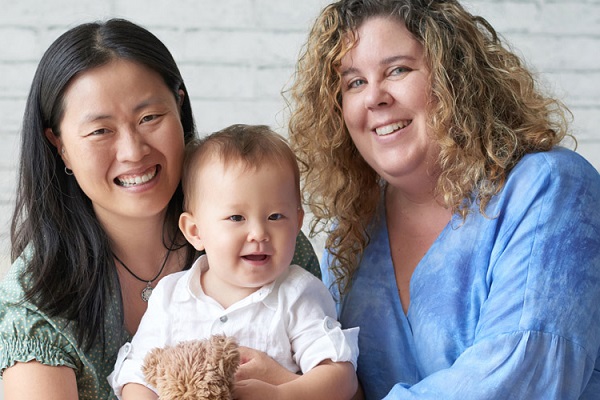 Two women with baby