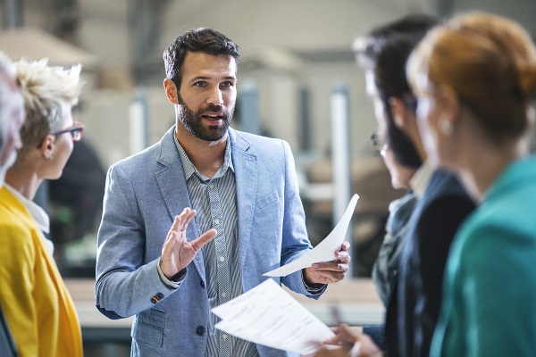 Man speaking to group