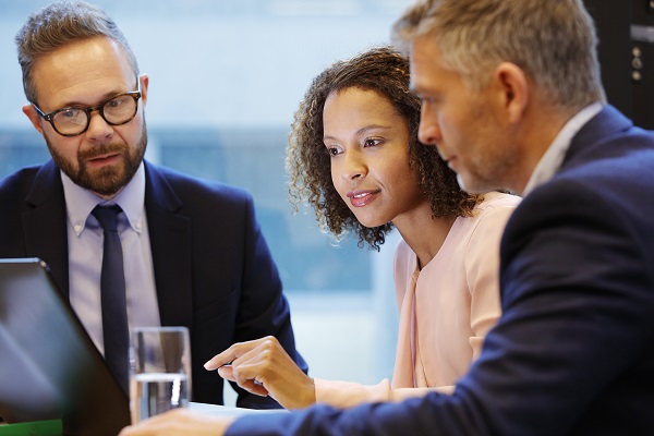 Advisior having a meeting with couple