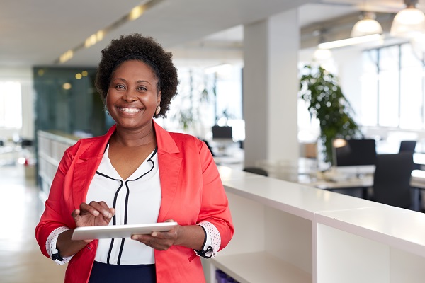 Female professional smiling at office