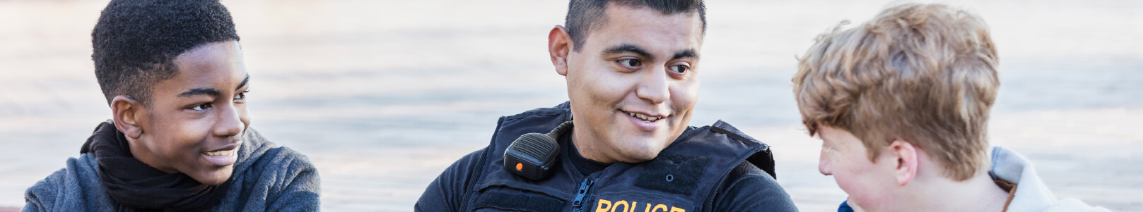 Policeman talking to the kids