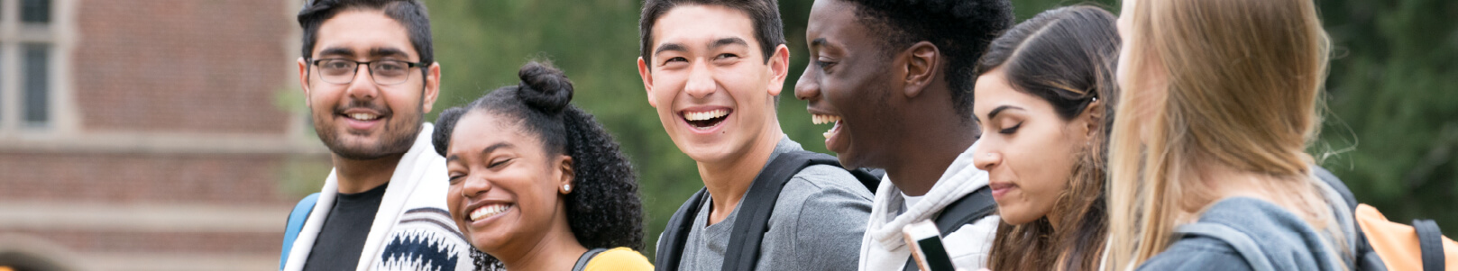 Young students male and female are smiling